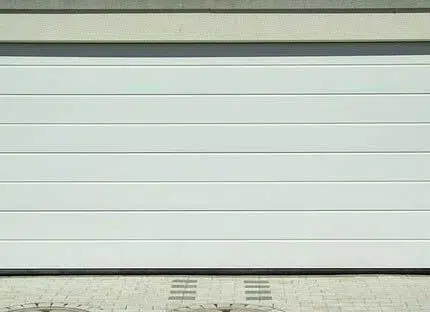 Comment lubrifier une porte de garage sectionnelle ?